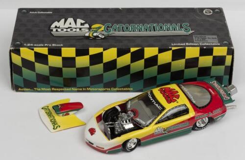 PONTIAC: A NOS 1:24 scale Action Collectables Pontiac Gatornationals 1998 Pro Stock "Mac Tools" die-cast model
