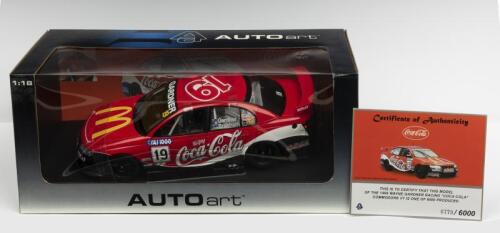 HOLDEN: A NOS 1:18 scale Autoart Holden VT Commodore #19 Gardner/Brabham 1999 "Coca-Cola" die-cast model with Numbered Certificate