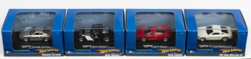 HOT WHEELS: Four NOS 1:87 scale Hot Wheels cars comprising Enzo Ferrari/Ford Mustang/Porsche Cayman & "Boneshaker" die-cast models including original cartons