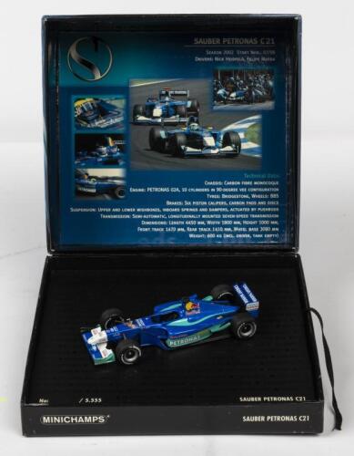 SAUBER: A NOS 1:43 scale Minichamps Formula 1 Sauber Petronas C21 2002 "Petronas" with Engine Sounds die-cast model