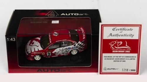 HOLDEN: A NOS 1:43 scale Autoart Holden VX Commodore Jason Bright #2 2002 "Holden Racing Team" die-cast model with numbered Certificate of Authenticity
