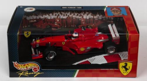 FERRARI: A NOS 1:18 scale Hot Wheels Formula 1 1999 Ferrari F399 #3 Michael Schumacher die-cast model