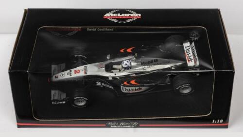 McLAREN: A NOS 1:18 scale Minichamps Formula 1 McLaren Mercedes 2000 MP 4/15 David Coulthard #2 die-cast model