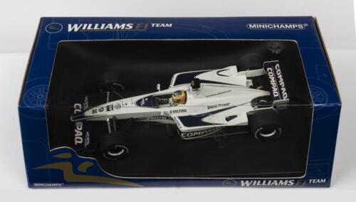WILLIAMS: A NOS 1:18 scale Minichamps Formula 1 Williams BMW 2000 FW22 R. Schumacher #9 die-cast model