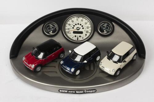 MINI COOPER: A NOS 1:36 scale Corgi Mini BMW Cooper Special Edition Set comprising 3 die-cast models with Stylised Instrument Cluster Base