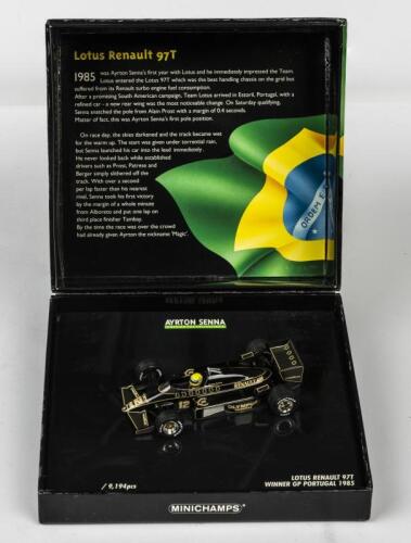 LOTUS: A NOS 1:43 scale Minichamps Formula 1 Lotus Renault #12 Ayrton Senna 1985 "Olympus" Winner Portugal GP die-cast model