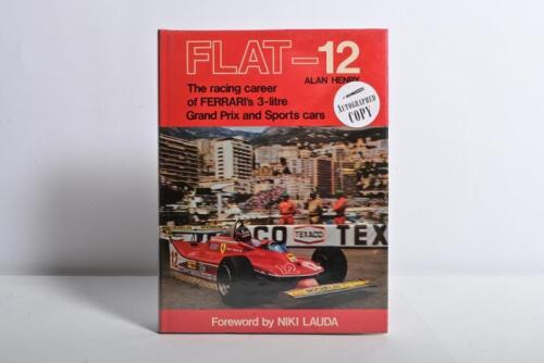 FERRARI: 'FLAT-12 FERRARI' hardcover book. Authored and signed by Alan Henry