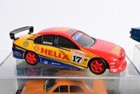 FORD: A collection of six Ford related models. TRAX (OPAL SERIES) Ford XB Falcon GT in orange and brown, Ford Escort MKI in orange & silver FORD TS-50 models - 4