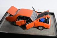 FORD: A collection of six Ford related models. TRAX (OPAL SERIES) Ford XB Falcon GT in orange and brown, Ford Escort MKI in orange & silver FORD TS-50 models - 6