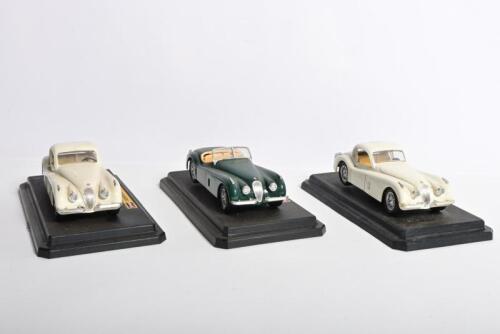JAGUAR: Three 1:24 scale Bburago Jaguar XK120 models. Coupes & Roadster