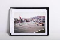 MOTOR RACING: Two interesting motor racing items. Motor racing print & '40 YEARS OF GRAND PRIX WINS McLAREN 1968 - 2008' Limited Edition box set - numbered '0043' - 4