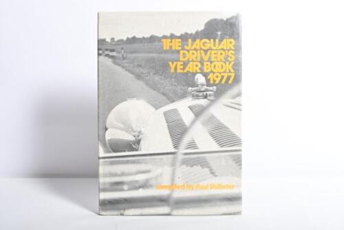 JAGUAR: 'THE JAGUAR DRIVER'S YEAR BOOK 1977' hardcover. Authored and signed by Paul Skilleter