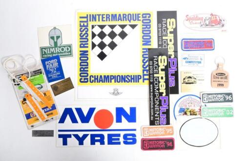 BADGES/STICKERS: A quantity of stickers and cloth badges. Aston Martin Owners Club 'GORDON RUSSELL INTERMARQUE CHAMPIONSHIP' square sticker & 'HISTORIC WINTON' cloth badges