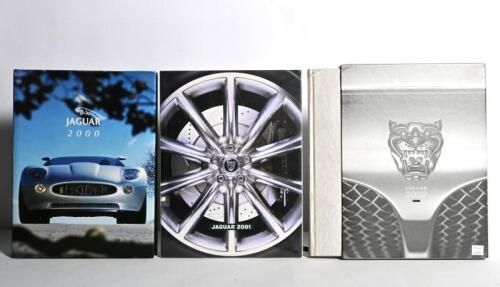 JAGUAR: Three Jaguar yearbooks. 'JAGUAR 2001' fly page signed by Jackie Stewart. Year books 2000 - 2002