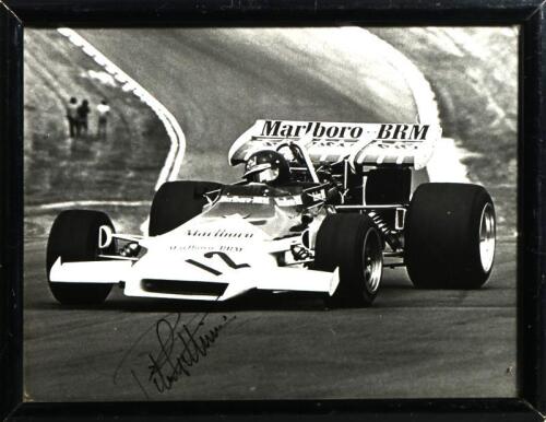 GETHIN: A black and white picture of Peter Gethin driving a Marlboro-BRM. Picture hand signed by Peter Gethin