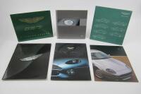 DB7: A group of Aston Martin DB7 related literature.