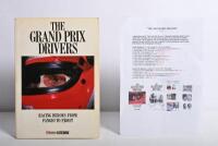 GRAND PRIX: 'THE GRAND PRIX DRIVERS' softcover book. Book signed by 10 World Champions and 5 Grand Prix winners. Signatures include Juan Manuel Fangio, Denis Hulme, Alan Jones, Rene Arnoux, Stirling Moss & Patrick Tambay. Superb signature set
