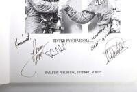 GRAND PRIX: 'THE GRAND PRIX DRIVERS' softcover book. Book signed by 10 World Champions and 5 Grand Prix winners. Signatures include Juan Manuel Fangio, Denis Hulme, Alan Jones, Rene Arnoux, Stirling Moss & Patrick Tambay. Superb signature set - 4