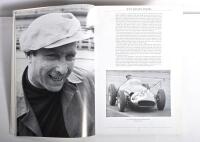 GRAND PRIX: 'THE GRAND PRIX DRIVERS' softcover book. Book signed by 10 World Champions and 5 Grand Prix winners. Signatures include Juan Manuel Fangio, Denis Hulme, Alan Jones, Rene Arnoux, Stirling Moss & Patrick Tambay. Superb signature set - 5