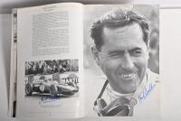 GRAND PRIX: 'THE GRAND PRIX DRIVERS' softcover book. Book signed by 10 World Champions and 5 Grand Prix winners. Signatures include Juan Manuel Fangio, Denis Hulme, Alan Jones, Rene Arnoux, Stirling Moss & Patrick Tambay. Superb signature set - 7