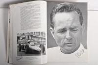 GRAND PRIX: 'THE GRAND PRIX DRIVERS' softcover book. Book signed by 10 World Champions and 5 Grand Prix winners. Signatures include Juan Manuel Fangio, Denis Hulme, Alan Jones, Rene Arnoux, Stirling Moss & Patrick Tambay. Superb signature set - 10