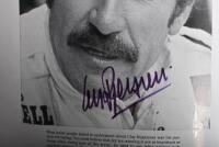 GRAND PRIX: 'THE GRAND PRIX DRIVERS' softcover book. Book signed by 10 World Champions and 5 Grand Prix winners. Signatures include Juan Manuel Fangio, Denis Hulme, Alan Jones, Rene Arnoux, Stirling Moss & Patrick Tambay. Superb signature set - 24