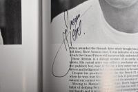 GRAND PRIX: 'THE GRAND PRIX DRIVERS' softcover book. Book signed by 10 World Champions and 5 Grand Prix winners. Signatures include Juan Manuel Fangio, Denis Hulme, Alan Jones, Rene Arnoux, Stirling Moss & Patrick Tambay. Superb signature set - 33