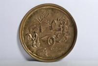 ROLLS-ROYCE: A brass plate with embossed image of a 1913 Rolls Royce