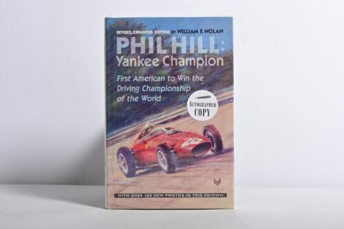 HILL: A superb copy of 'PHIL HILL: Yankee Champion, First American to Win the Driving Championship of the World' hardcover book by William F.Nolan. Phil Hill signature