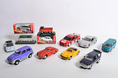 DIECAST: An assortment of diecast vehicles. Alfa Romeo, BMW, Mitsubishi, Porsche, Volkswagen models. Boxed Welly models. Scalextric Aston Martin DB4 G.T