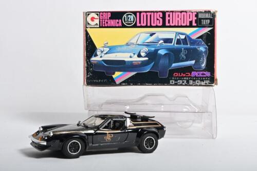 LOTUS: A Japanese 1:28 scale EIDAI GRIP LOTUS EUROPE (13). Black with 'JPS' decals. Original box