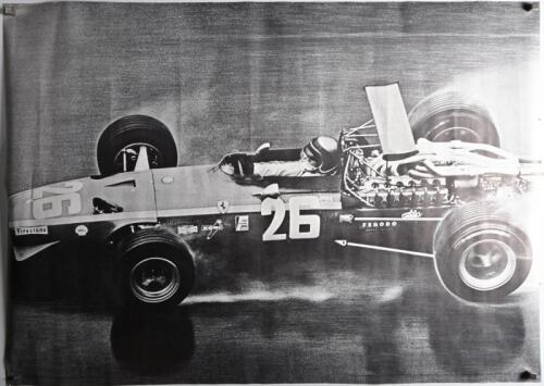 FERRARI: A black and white poster from 1969 of Jacky Ickx racing a Ferrari F1 at 1968 French Grand Prix