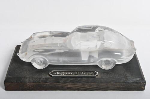 JAGUAR: A glass desk piece in the form of a Jaguar E-Type