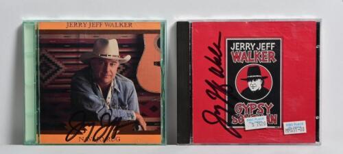 JERRY JEFF WALKER: Two Jerry Jeff Walker CDs 'Gypsy Songman' and 'Navajo Rug' autographed on covers