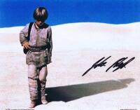 STAR WARS: A colour picture of young Anakin Skywalker autographed by Jake Lloyd with numbered COA