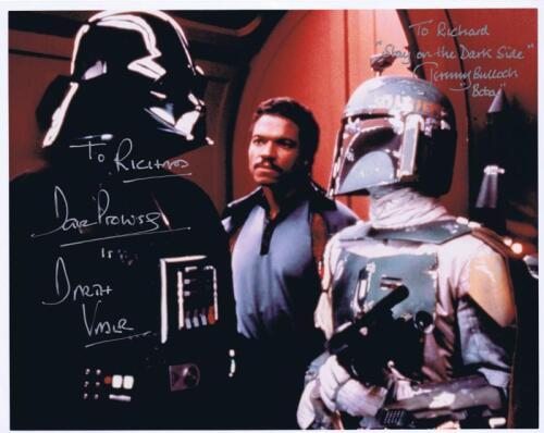 STAR WARS: A colour picture depicting Darth Vader and Boba Fett signed "To Richard" By Dave Prowse and Jeremy Bulloch