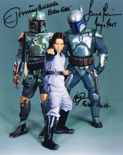 STAR WARS: A excellent colour picture depicting Boba Fett and Jango Fett on photographic paper autographed by Jeremy Bulloch, Temuera Morrison and Daniel Logan
