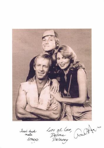 PAUL HOGAN SHOW: A black and white picture from The Paul Hogan Show depicting Paul Hogan, Delvene Delaney, and John Cornell. Autographed by all 3 members.