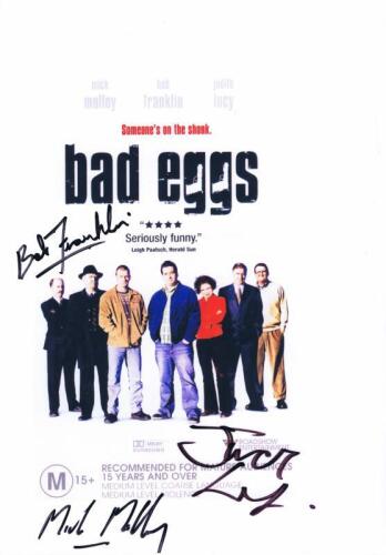 BAD EGGS: A colour printed movie poster from 'Bad Eggs' autographed by Mick Molloy, Bob Franklin and Judith Lucy.