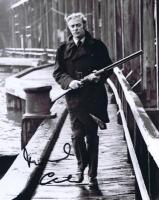 MICHAEL CAINE: A black and white picture depicting Michael Caine from "Get Carter" autographed by Michael Caine