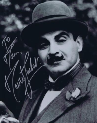 HERCULE POIROT: A black and white picture of Hercule Poirot, personally signed and inscribed by David Suchet