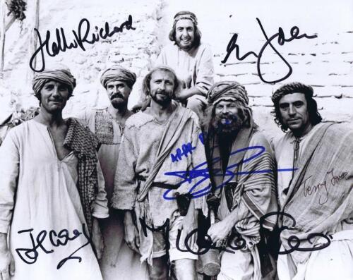 LIFE OF BRIAN: A black and white group picture depicting 'Life of Brian' members autographed by Terry Jones, Eric Idle, John Cleese, Michael Palin, and Terry Gilliam, personally inscribed 'To Richard'