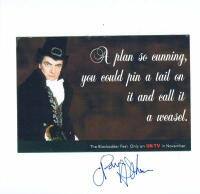 ROWAN ATKINSON: A colour picture from 'The Blackadder' autographed by Rowan Atkinson