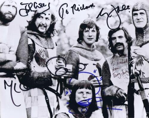 MONTY PYTHON: A black and white picture of 'Monty Python and The Holy Grail' autographed by Terry Jones, Eric Idle, John Cleese, Michael Palin, and Terry Gilliam, personally inscribed 'Hi Richard'