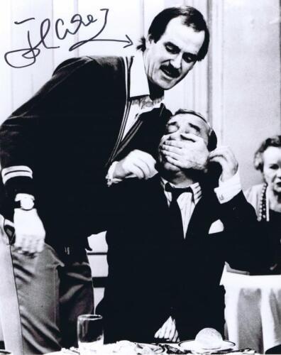 FAWLTY TOWERS: A black and white picture of from Fawlty Towers, autographed by John Cleese