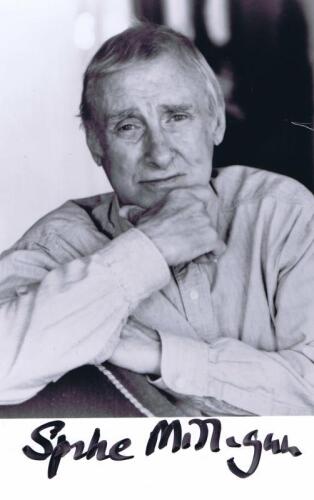 SPIKE MILLIGAN: A black and white portrait card of Spike Milligan from "The Goons" autographed by Spike Milligan