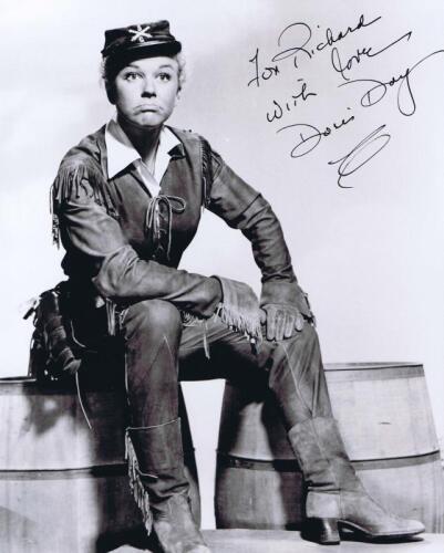 DORIS DAY: A black and white picture of Doris Day as 'Calamity Jane' personally inscribed and signed by Doris Day