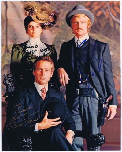 BUTCH CASSIDY: A colour picture from 1969 film 'Butch Cassidy and the Sundance Kid' personally inscribed and signed by Robert Redford, Paul Newman and Katharine Ross