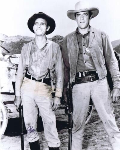 GUNSMOKE: A black and white picture depicting Matt Dillon and Chester in 'Gunsmoke' autographed by Dennis Weaver