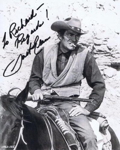 JACK ELAM: A black and white picture depicting Jack Elam on horse back, personally signed and inscribed by Jack Elam